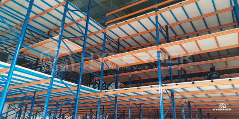 Warehouse mezzanine floor with steel structure and shelving units
