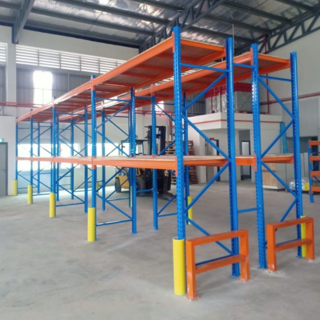 Twin bay racking system in a warehouse for maximized storage space.