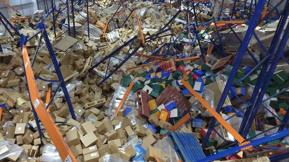 Fallen industrial racking system in a warehouse